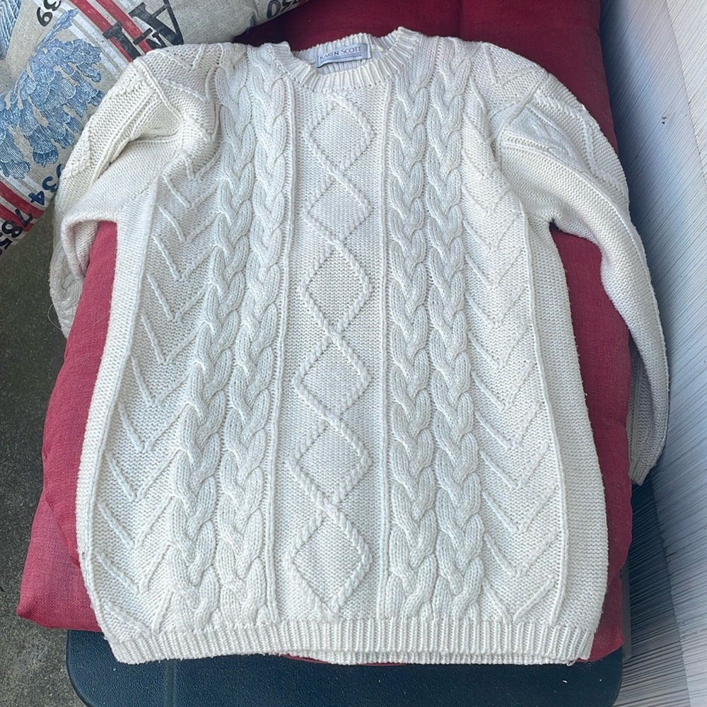 long cream colored sweater